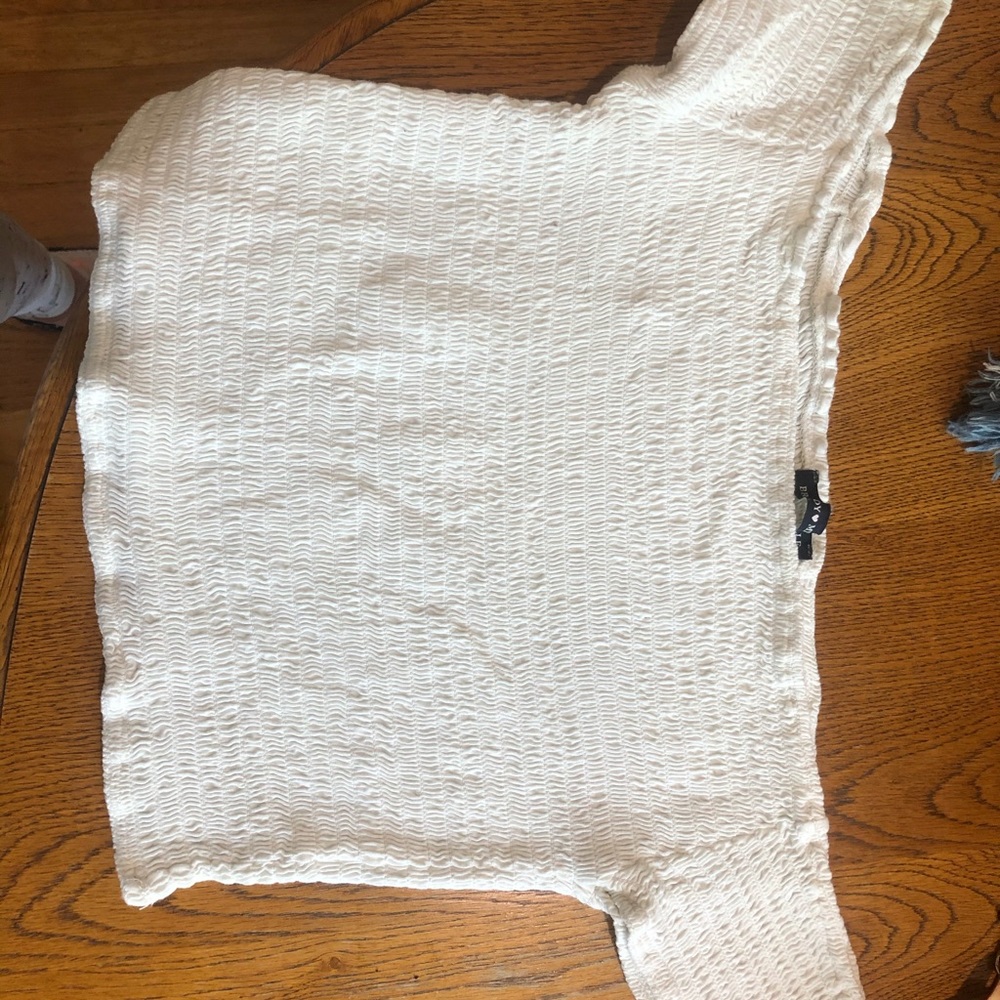Cute white Brandy Melville over the shoulder top!